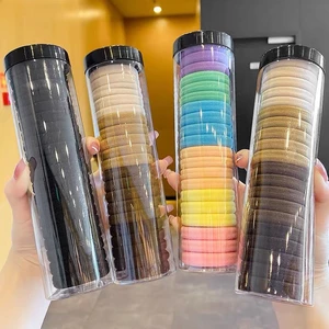 Dây buộc tóc 20 lon chiếc co dãn màu đen đựng trong ống trong suốt phong cách Hàn Quốc tiện dụng giá rẻ