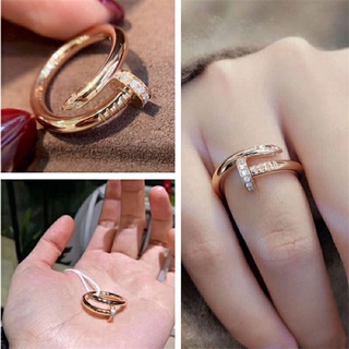 Nhẫn đinh đính đá titan không gỉ giống Rose