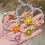 Set 100 Chun buộc tóc hoa cúc nhiều màu pastel hottrend Qiqishop