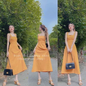 váy 2 dây maxi vàng nơ lưng siêu kute