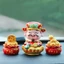 Mô hình ông thần tài ngồi hũ tiền trang trí nhà cửa, bàn làm việc, bàn học, tủ sách, taplo ô tô, quà tặng
