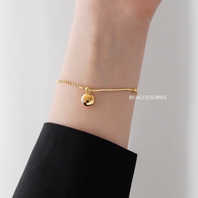 Lắc tay nữ titan dây bi phối mặt tròn Lucky không gỉ
