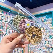 BÁN GIÁ SỈ Set 100 Dây Buộc Tóc(Loại Túi Zip Hoa Cúc Mới)