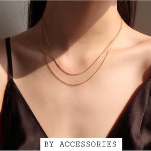 Dây chuyền titan 2 tầng dây mì và xích cong mảnh không gỉ