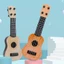 Đàn Ukulele Thiết Kế 4 Dây Nhỏ Gọn Đồ Chơi Giáo Dục Vui Nhộn Cho Bé