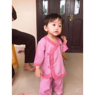 Tim phối thời trang bé gái. áo lam đi chùa trẻ em