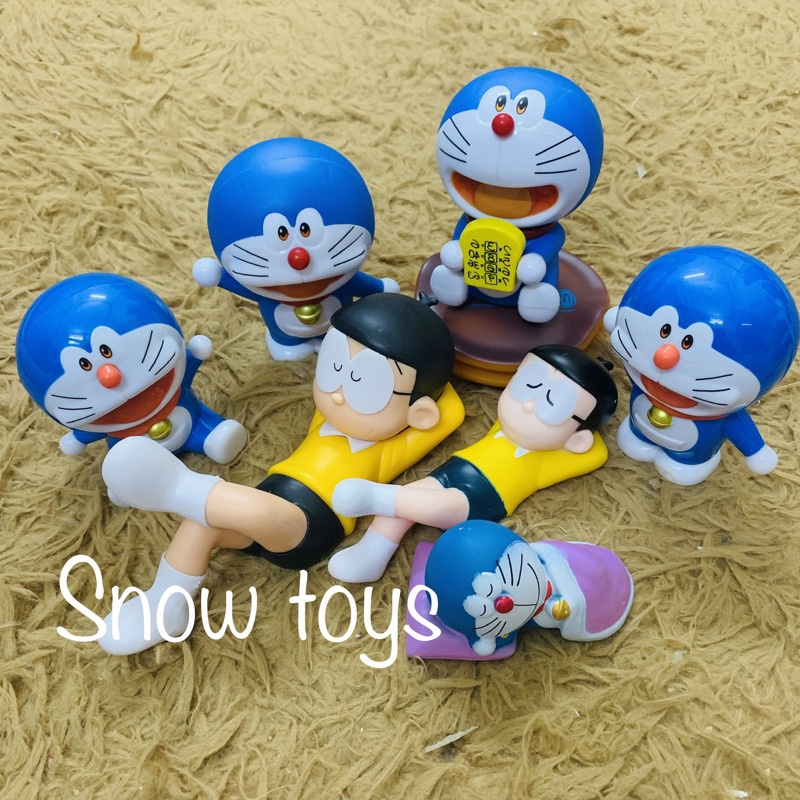 Mô hình Nobita nằm ngủ - Doraemon cầm bánh - Bánh rán Dorayaki ...