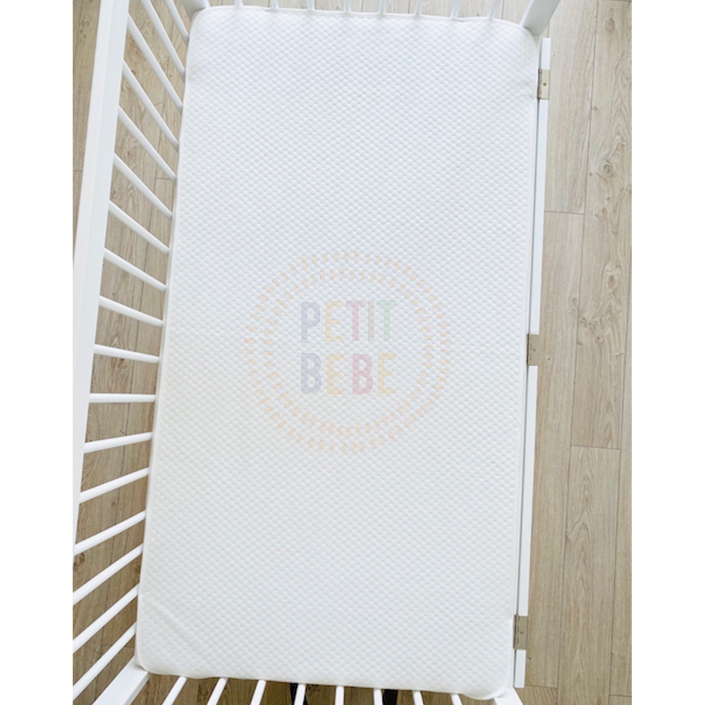 Mô tả Lót chống thấm bảo vệ nệm cũi cho bé PETIT BEBE cotton chun 4 góc tiện lợi - 1