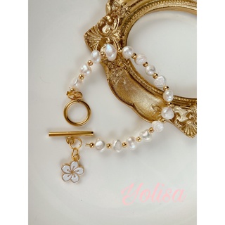 Vòng tay nữ handmade n gọc nhân tạo charm hoa