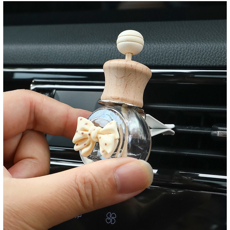 Lọ đựng nước hoa kẹp cửa gió điều hòa dễ thương trên xe Ô tô ( tặng kèm 1 lọ tinh dầu thơm )