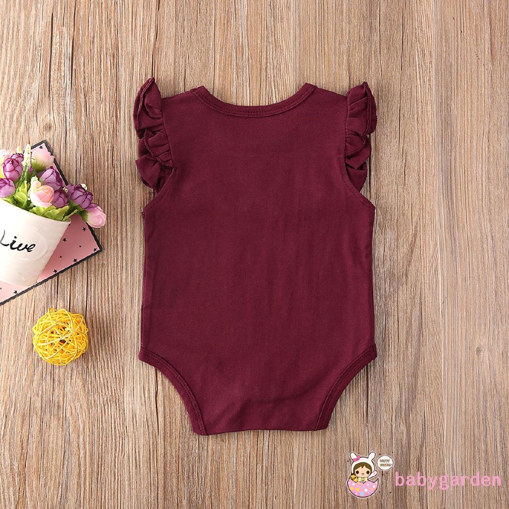 Áo liền quần cổ bèo nhún cho bé gái