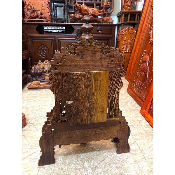 Đồng hồ quả lắc để bàn gỗ mun đuôi công