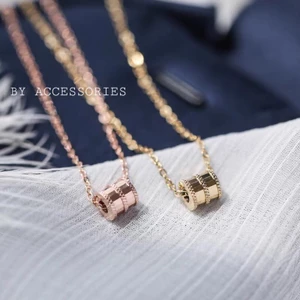 Dây chuyền titan mặt trụ nhỏ viền chéo không gỉ