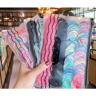 Túi zip 100 sợi thun cột tóc, chun buộc tóc du lịch siêu dễ thương, dây buộc tóc co giãn (giao màu ngẫu nhiên)