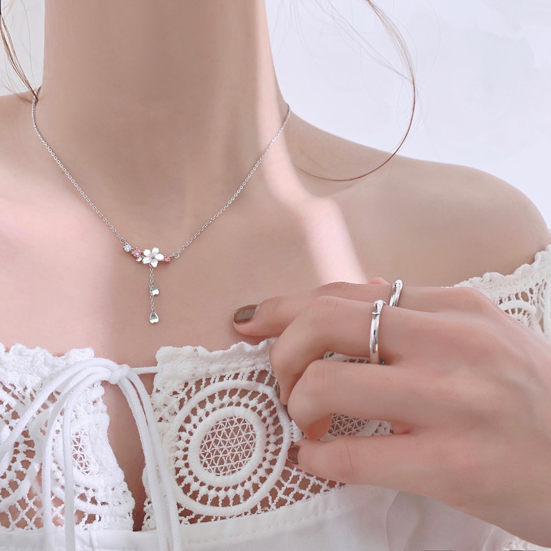 Dây Chuyền Mặt Hình Hoa Anh Đào Vỏ Sò Màu Hồng Phối Tua Rua Phong Cách Hàn Quốc