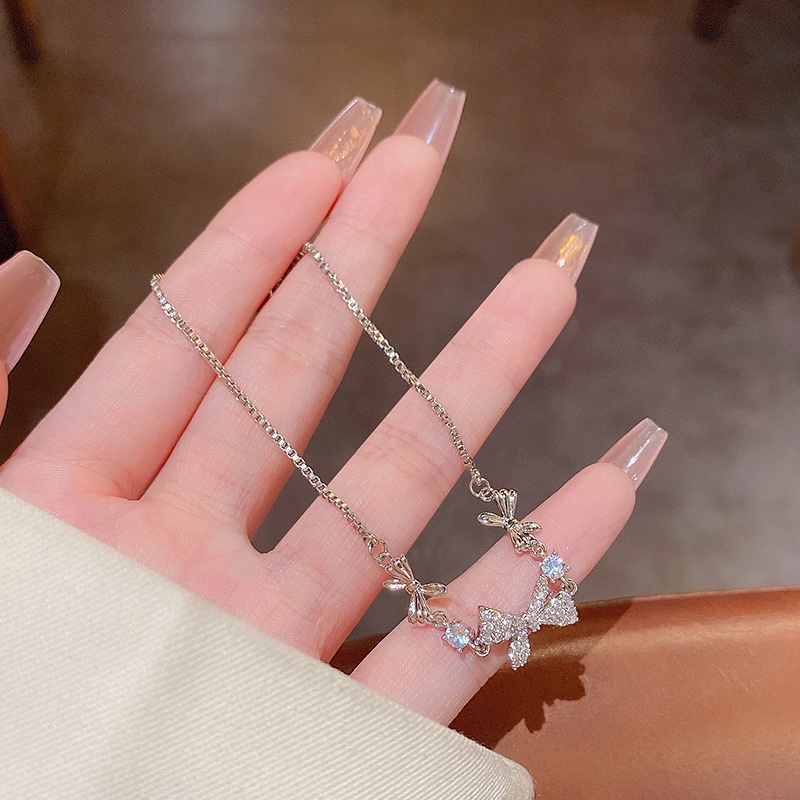 Vòng Cổ Chất Liệu Thép Titan Mặt Nơ Đính Đá Thời Trang Cho Nữ