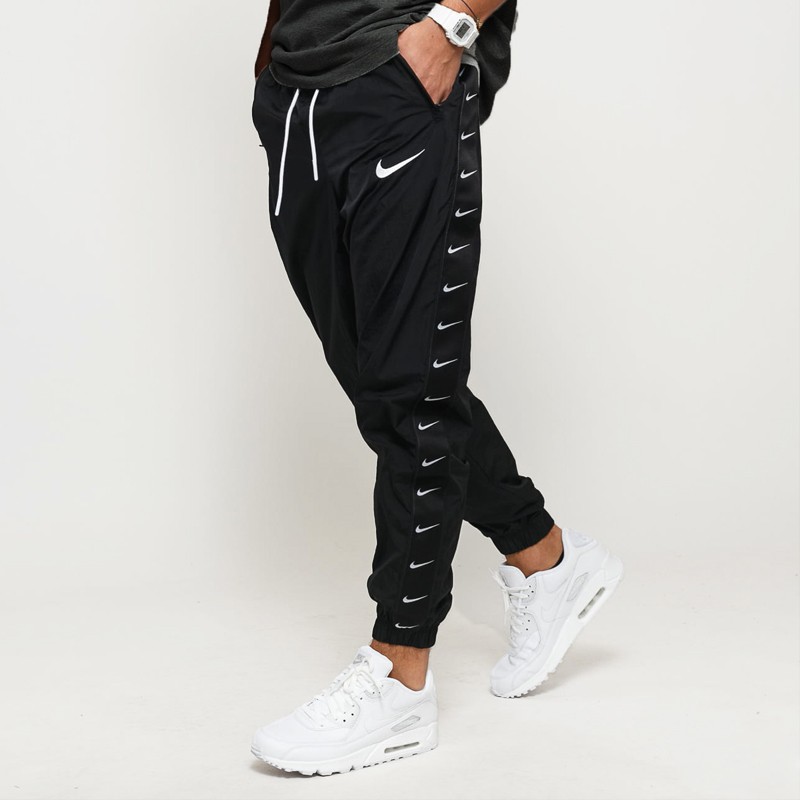 Nike taped swoosh hot sale popover jacket