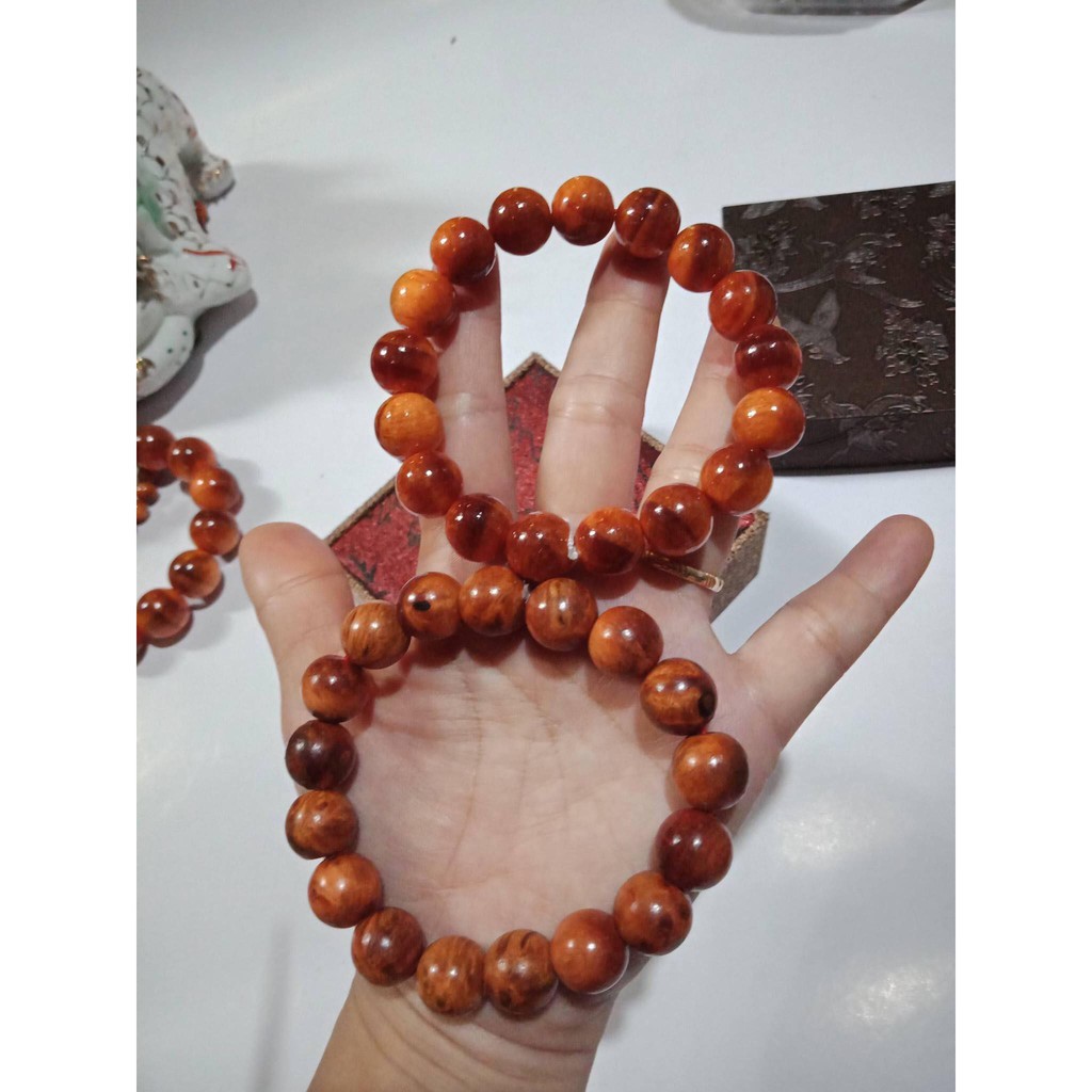 vòng phong thủy đeo  tay gỗ huyết long 12ly