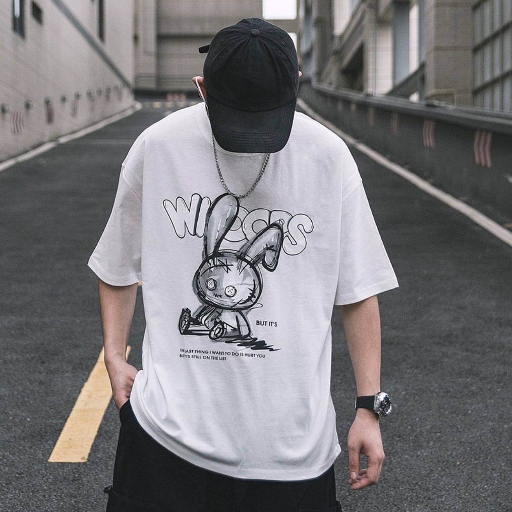 Áo Thun Nam Form Rộng HappyTee - Mẫu Graphic Thỏ WIOOPS Trẻ Trung Chất Vải Cotton 100 - 2 Màu Đen Trắng