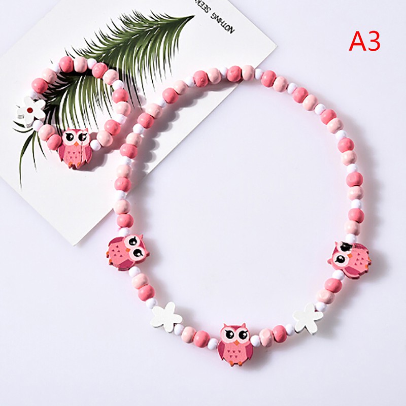 Vòng tay và dây chuyền chuỗi hạt gỗ hoạt hình cho bé gái
