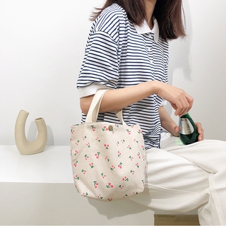 GC2 Phong cách mục vụ mới các yếu tố hoa nhỏ và đa năng khóa đồng túi vải nhỏ thông thường túi vải di động CG