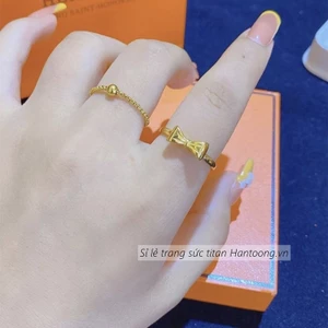 Nhẫn titan không gỉ mạ vàng 18k thiết kế hình chiếc nơ xinh xắn dễ thương dành cho nữ
