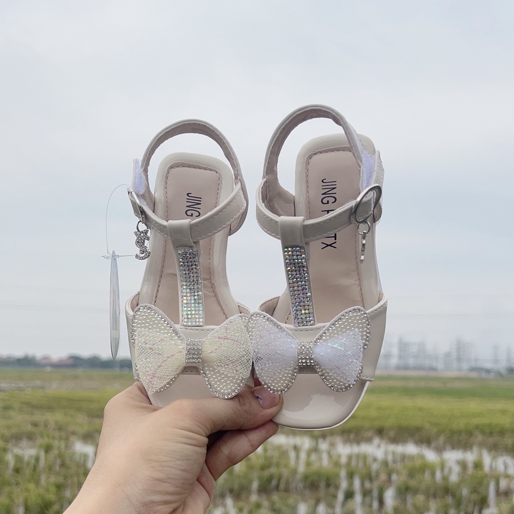 sandal cao cấp có gót cho bé gái dép quay hậu cho bé đế dẻo da bóng êm chân nơ lưới đá sng chảnh 8101
