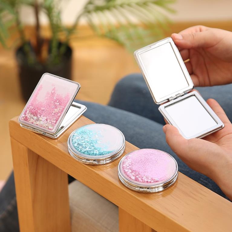 Gương trang điểm mini cầm tay gương gập 2 mặt kim tuyến nước chảy lên xuống