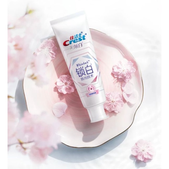 Kem đánh răng Crest Hoa Anh Đào, Quả Đào bản Trung 120g - Giúp răng trắng sáng và hơi thở thơm mát