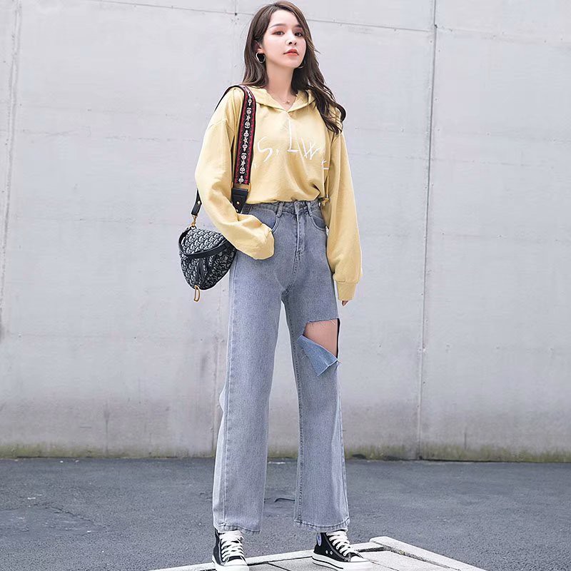 Ảnh Quần jean nữ lưng cao ống rộng dáng suông dạng rách gối cá tính 1