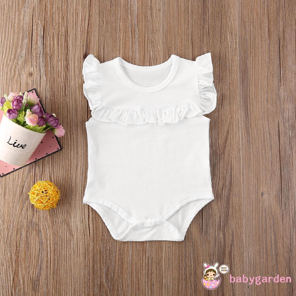 Áo liền quần cổ bèo nhún cho bé gái