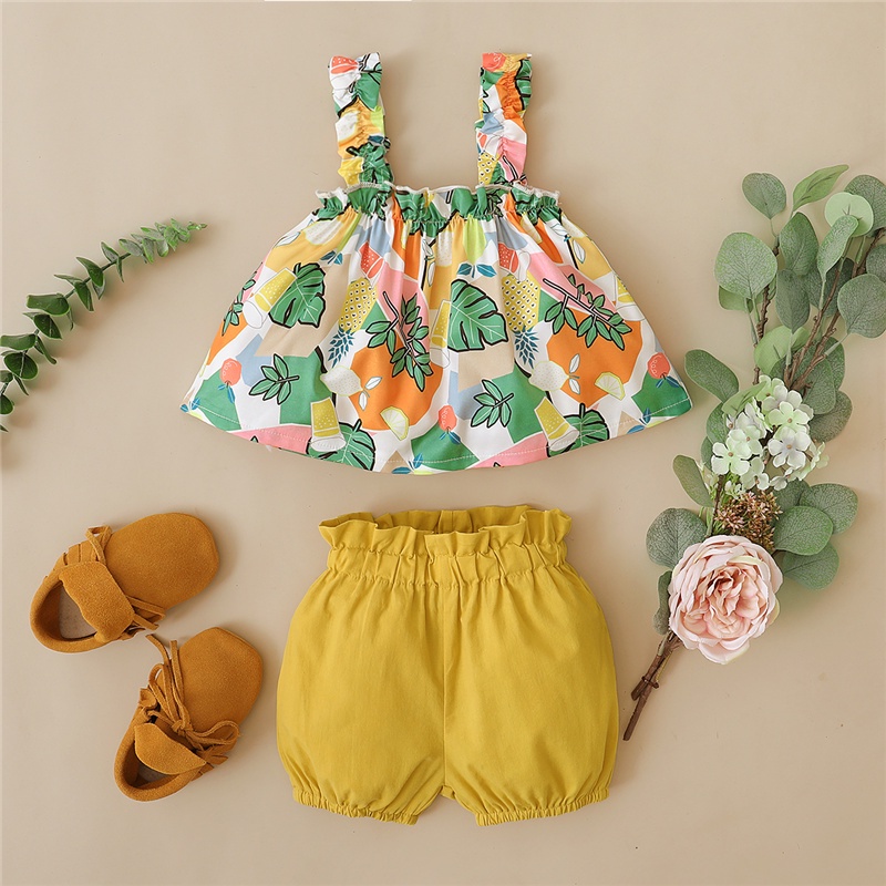 Set đồ 2 mảnh Mikrdoo gồm áo hai dây in hình hoa + quần short màu vàng phong cách mùa hè thời trang cho bé gái