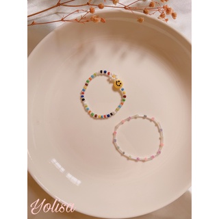 Vòng tay hạt cườm hoa Daisy và mặt cười