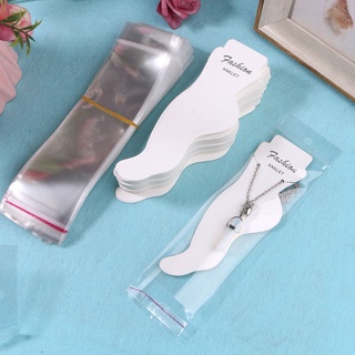 Thẻ trưng bày gồm vòng chân, túi trong suốt và kẹp thẻ trống