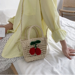 Túi cói mini đeo chéo gắn quả đỏ - đan lưới ô vuông thưa