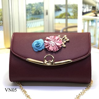Ví nữ cầm tay có dây đeo chéo