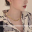 Dây chuyền titan không gỉ mạ vàng 18k thiết kế xoắn chéo thời trang sang trọng dành cho nữ