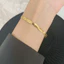 Dây chuyền titan không gỉ mạ vàng 18k thiết kế xoắn chéo thời trang sang trọng dành cho nữ