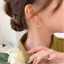 Khuyên tai titan không gỉ mạ vàng 18k dạng tròn thiết kế hoạ tiết lấp lánh phong cách trẻ trung dành cho nữ