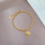 Vòng tay titan không gỉ dạng bi tròn mạ vàng 18k thiết kế mặt chữ phúc hình tai thỏ dễ thương dành cho nữ