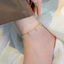 Lắc chân nữ làm bằng titan cao cấp mạ vàng 24k thiết kế nhiều bi tròn xinh xắn phong cách nhẹ nhàng thanh lịch