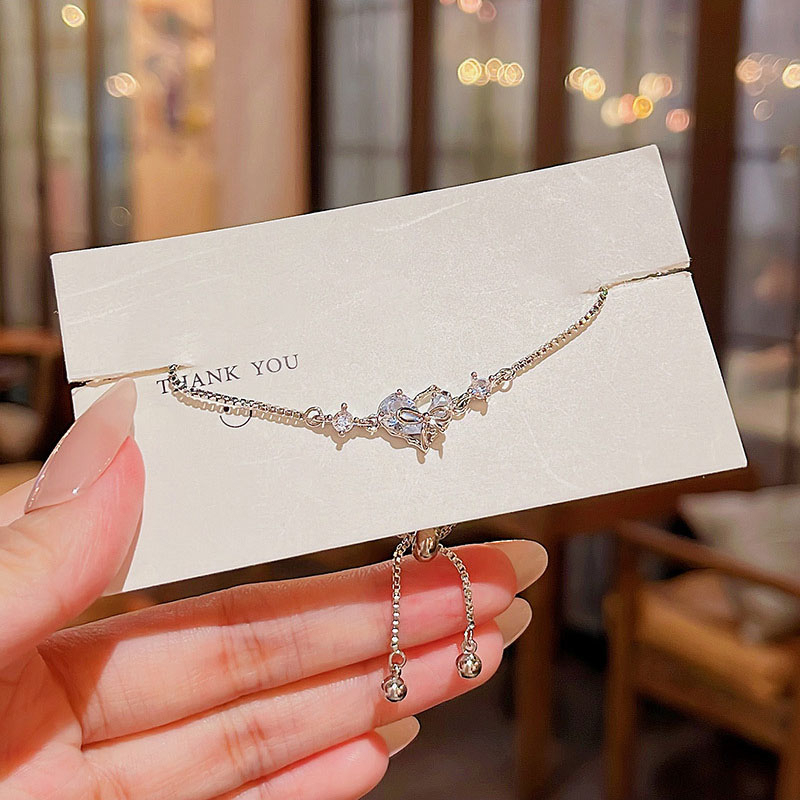 Sang trọng tinh tế zircon heart bow vòng tay phụ nữ pull-out hand jewelry