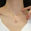 Dây chuyền titan nữ mạ vàng 18k hình hoa gắn đá long lanh sang trọng quyến rũ