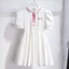 Trẻ Em Phong Cách Mới Thời Trang Váy Ngắn Tay Thời Trang Bé Gái Preppy Phong Cách Ngọt Ngào Xếp Ly Đầm Công Chúa