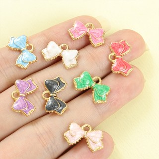20 Chiếc Thời Trang Đầy Màu Sắc Thắt Nơ Men Quyến Rũ Cho Bé Gái Trang Sức Làm Nơ Sống Động Dễ Thương Nhỏ Giọt Dầu Mặt Dây Hợp Kim Phù Hợp Với Vòng Cổ DIY Bông Tai Vòng Tay Và Bất Kỳ Đồ Trang Trí Dây Chuyền Khác