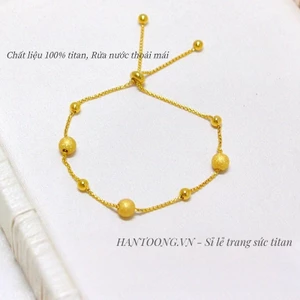 Lắc tay titan cao cấp không gỉ mạ vàng 24k dạng bi phun cát thiết kế rút sợi có thể điều chỉnh kích cỡ dành cho nữ