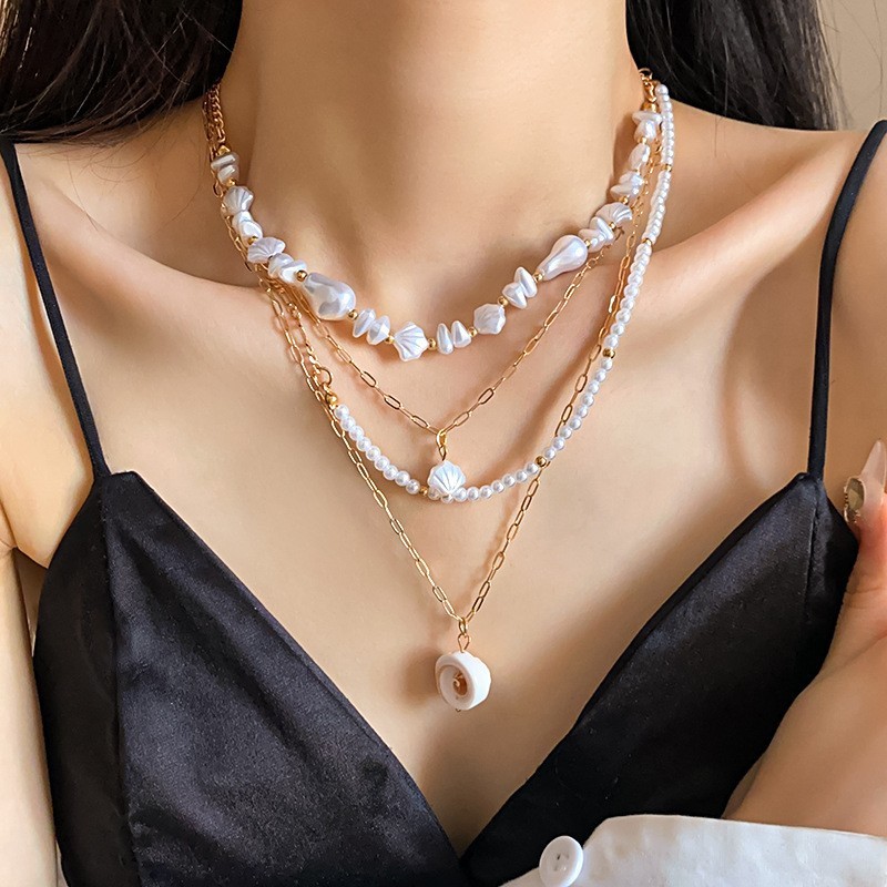 Bộ vòng cổ ngọc trai vỏ biển Châu Âu và Hoa Kỳ xuyên biên giới đi biển ngày lễ xương đòn chuỗi khí chất trang sức cao cấp nữ