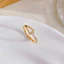 Nhẫn titan không gỉ mạ vàng 18k thiết kế hình giọt nước thời trang tinh tế dành cho nữ