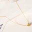 Dây chuyền titan cao cấp mạ vàng 24k thiết kế mặt bi khắc khía cạnh thời trang đơn giản dành cho nữ