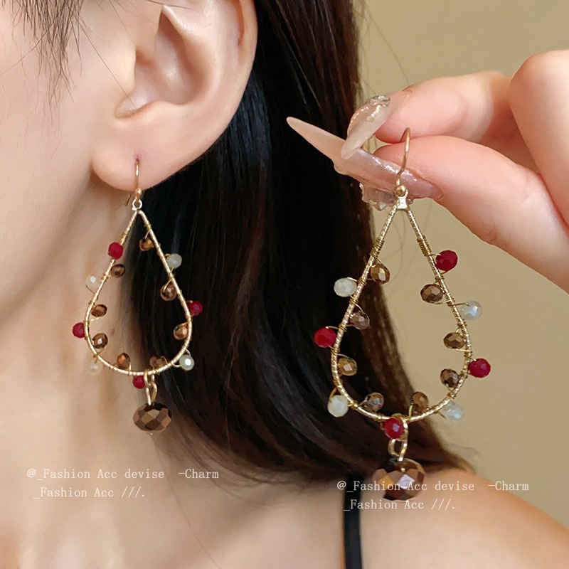 Dân tộc gió tròn giọt nước rỗng móc tai retro cao cấp cảm giác tua rua bông tai Thời trang ánh sáng sang trọng xu hướng bông tai bán buôn